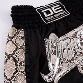 Black/Yellow Danger Equipment Wild Line Muay Thai Short Logo Yellow Front